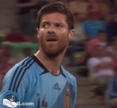 Man In Tan Sweater Eating Meat GIF