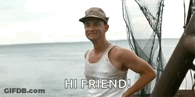 Man In Tank Top And Hat On Boat Saying Hi Friend GIF