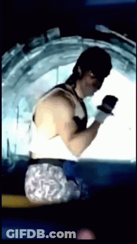 Man In Tank Top And Shorts Boxing GIF