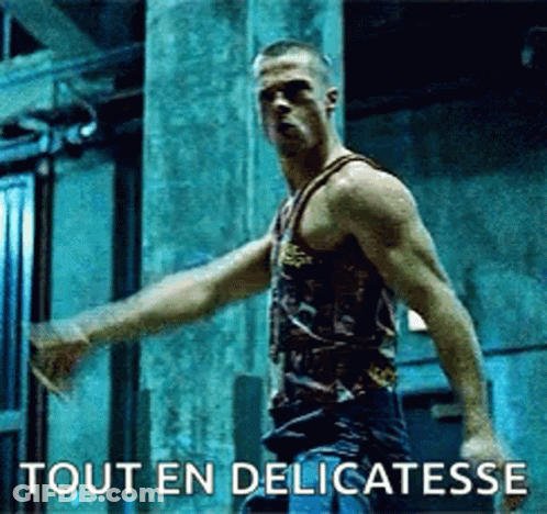 Man In Tank Top Arms Outstretched Says Tout En Delicatesse GIF