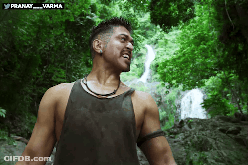 Man In Tank Top At Waterfall Pranay Varma GIF
