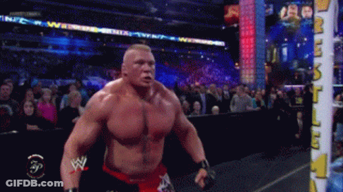Man In Tank Top Holding Dumbbell GIF