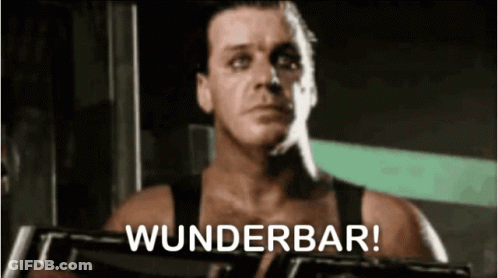 Man In Tank Top Holding Gun Says Wunderbar GIF