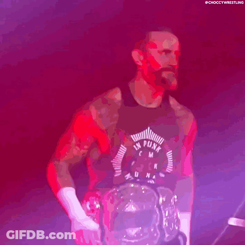Man In Tank Top Holding Trophy GIF