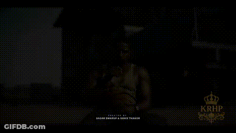 Man In Tank Top Singing Into Microphone GIF