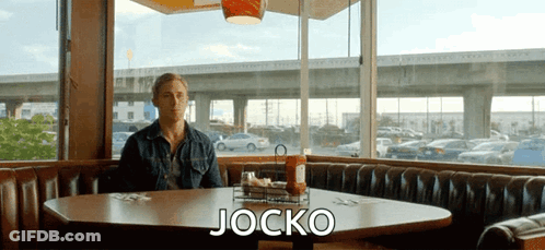 Man In Tank Top With Bull Says You Have To Go After It GIF