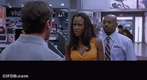 Man In Tech Shirt Talking To Woman GIF