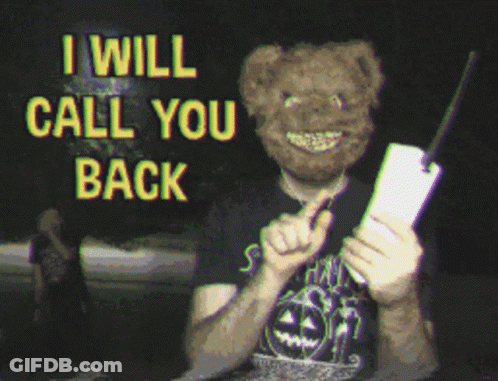 Man In Teddy Bear Mask And Samhain Shirt Holding Knife GIF