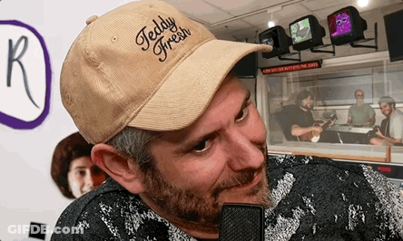Man In Teddy Fresh Hat Looking At Camera GIF