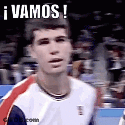 Man In Tennis Uniform Making Funny Face In Crowd GIF
