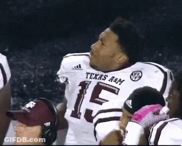 Man In Texas A&M Football Jersey With Teammates GIF
