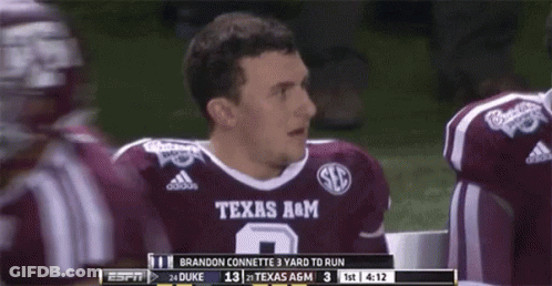 Man In Texas A&M Jersey Sitting In Locker Room GIF