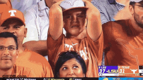 Man In Texas Shirt Watching LSU Game GIF