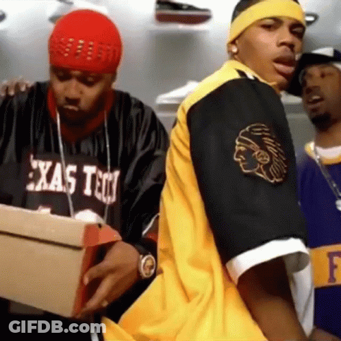 Man In Texas Tech Shirt Holding Cardboard Box GIF