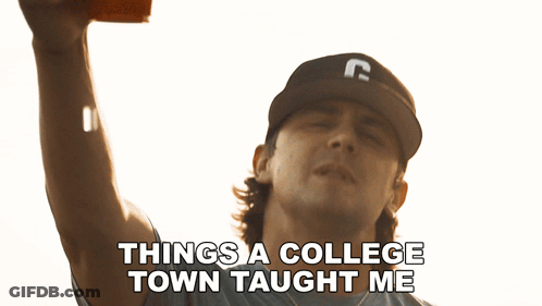 Man In Texas Tech Shirt Holding Cup GIF