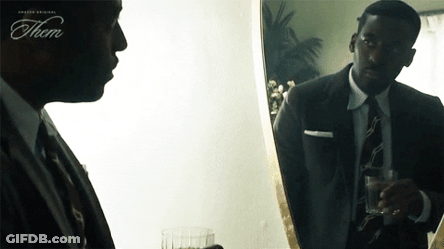 Man In The Mirror Drinking From Glass GIF