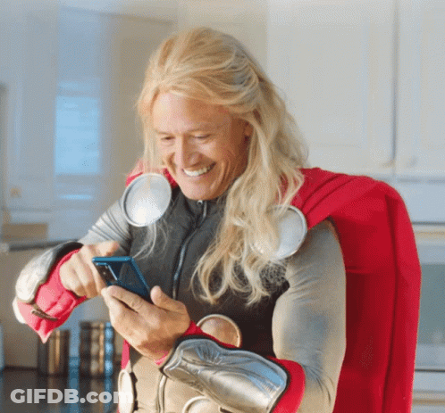 Man In Thor Costume Looking At Phone GIF