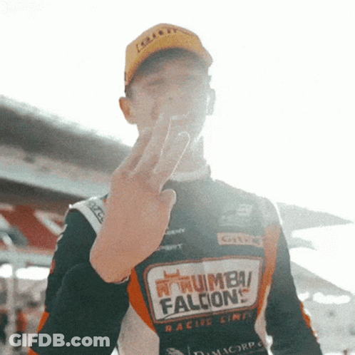 Man In Thumb Falcons Shirt GIF
