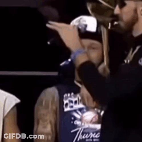 Man In Thunder Shirt And Another Man GIF
