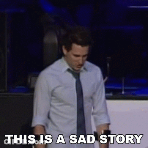 Man In Tie And Sign This Is A Sad Story GIF