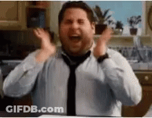 Man In Tie And White Shirt Making Funny Face GIF