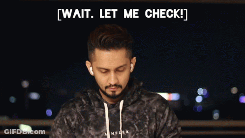 Man In Tie-Dye Hoodie Wait Let Me Check GIF