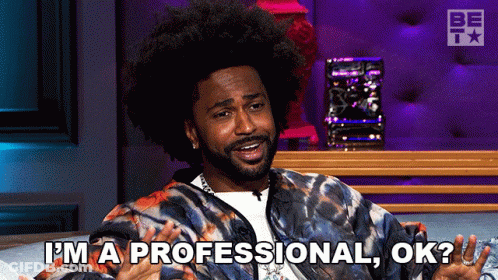 Man In Tie Dye Jacket Says I'm A Professional Ok GIF