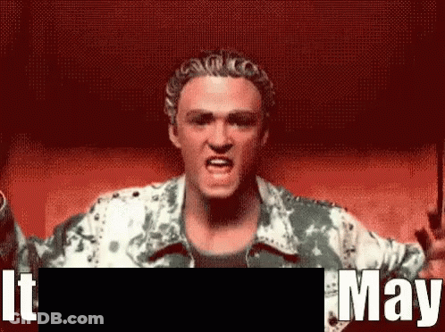 Man In Tie Dye Jacket Screaming GIF