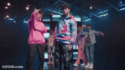 Man In Tie Dye Sweatshirt Dancing With Man In Pink Sweatshirt GIF