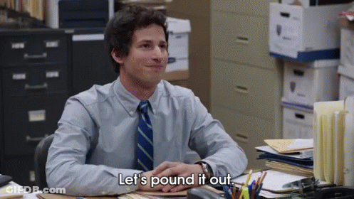 Man In Tie Saying Let's Pound It Out GIF