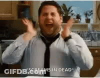 Man In Tie Screaming In Kitchen GIF