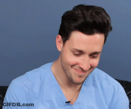Man In Tie Sitting And Crying GIF