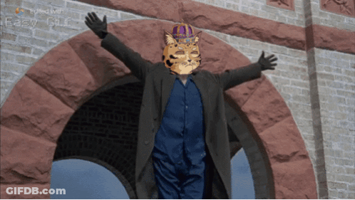 Man In Tiger Mask And Crown With Arms Outstretched GIF