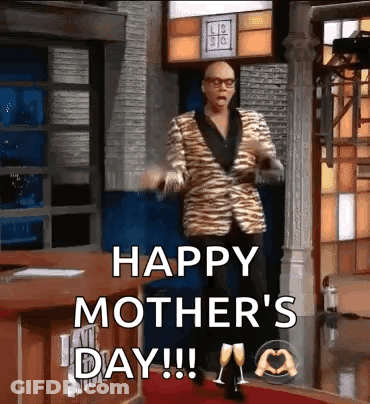 Man In Tiger Print Suit Dancing On Red Carpet Says Happy Mother's Day GIF