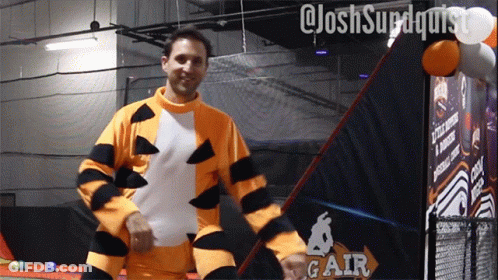 Man In Tigger Costume With Gar Sign GIF