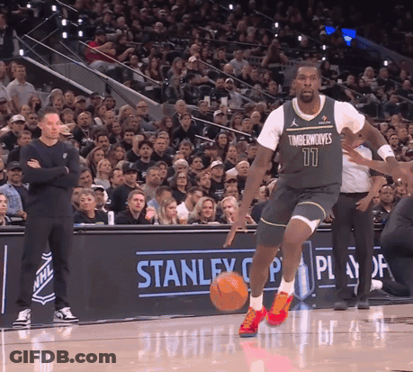 Man In Timberwolves Jersey Dribbling Basketball GIF