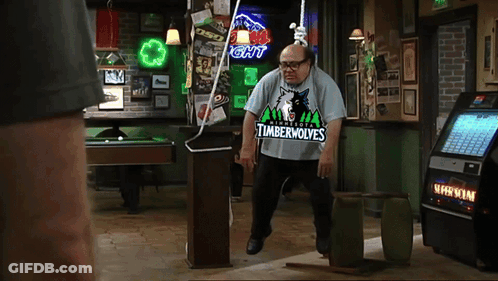 Man In Timberwolves Shirt In Pool Hall GIF