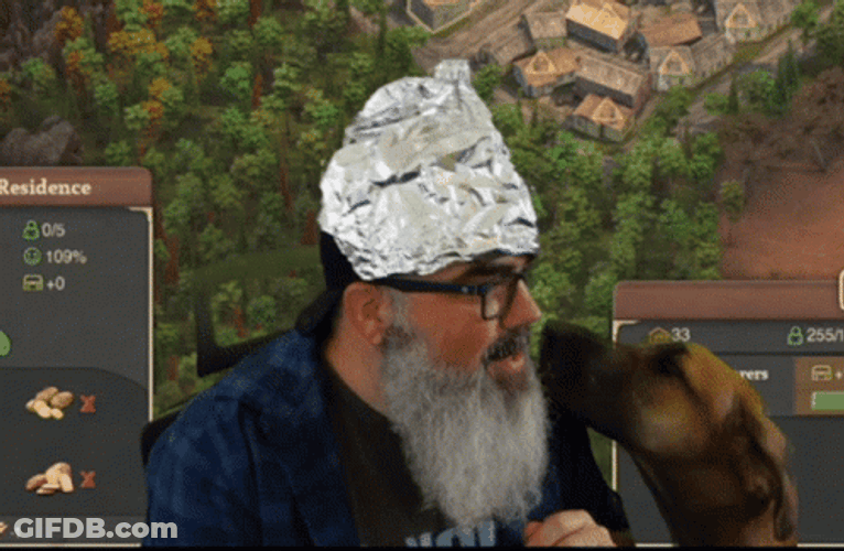 Man In Tinfoil Hat Dog Kissing GIF