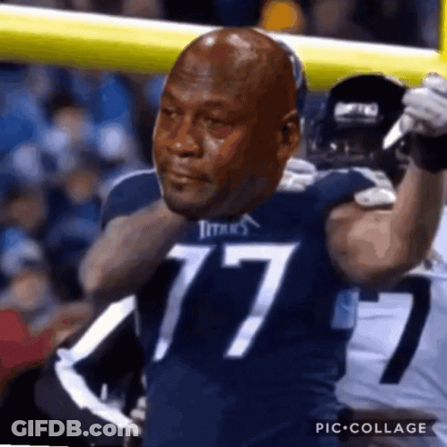 Man In Titans Jersey Holding Football GIF