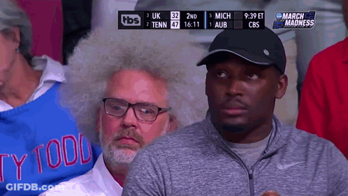 Man In Todd Sweater Watching Game GIF