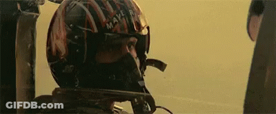 Man In Top Gun Hat Saluting Close Up GIF
