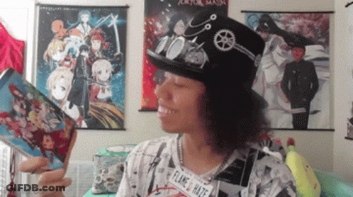 Man In Top Hat And Flame Necklace GIF