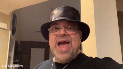Man In Top Hat And Glasses Making Face GIF