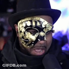 Man In Top Hat And Gold Mask GIF