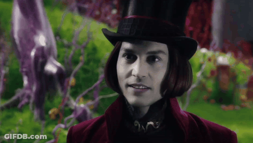 Man In Top Hat And Purple Jacket GIF