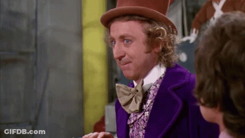 Man In Top Hat And Purple Suit Talking To Another Man GIF