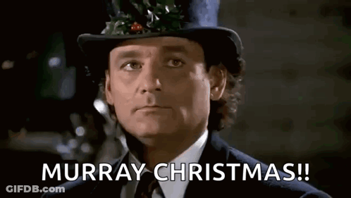 Man In Top Hat And Suit Saying Murray Christmas GIF
