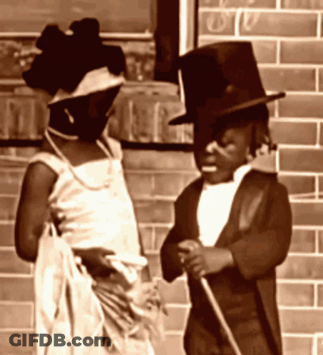 Man In Top Hat And Woman In White Dress GIF
