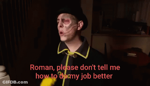 Man In Top Hat And Yellow Gloves Says Roman GIF
