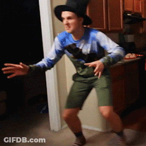 Man In Top Hat Dancing In Kitchen GIF